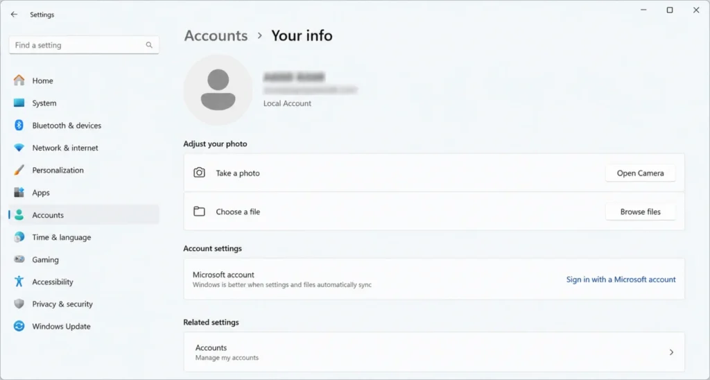 Windows 11 Accounts settings screen showing the option to sign in with a local account instead